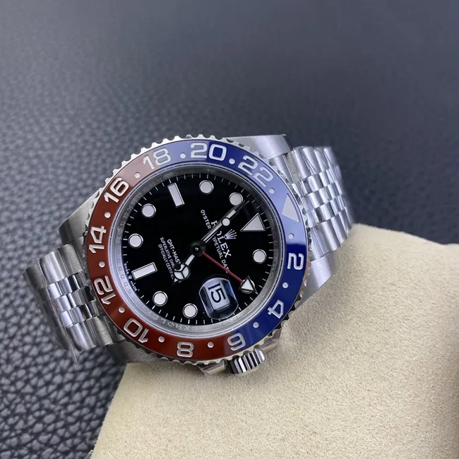 New top-tier watch, Rolex GMT-Master II "Coke" edition in red and blue, jubilee bracelet, automatic mechanical steel band, men's watch, side view.