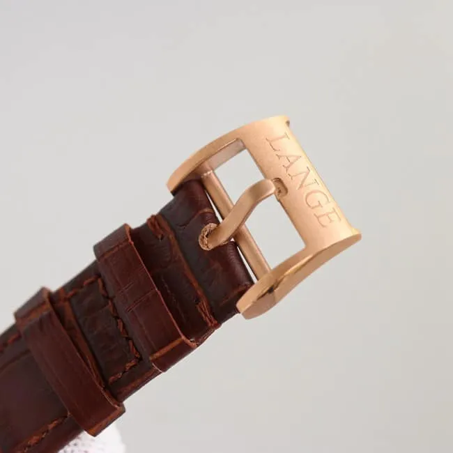 top-tier Lange SAXONIA series two-hand rose gold steel case front view