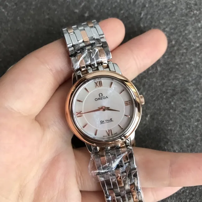 DK factory top-tier replicaOmega super a watch women's white dial gold steel bracelet natural real diamond butterfly series quartz watch side view