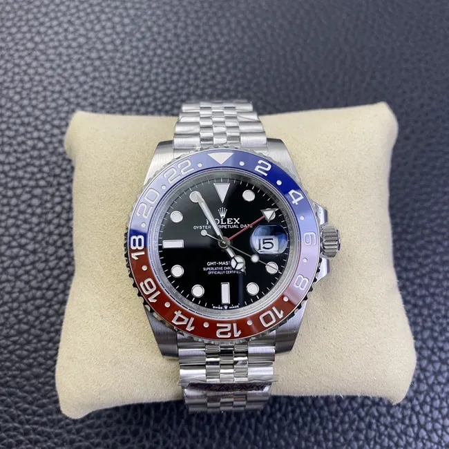 New top-tier watch, Rolex GMT-Master II "Coke" edition in red and blue, jubilee bracelet, automatic mechanical steel band, men's watch, side view.
