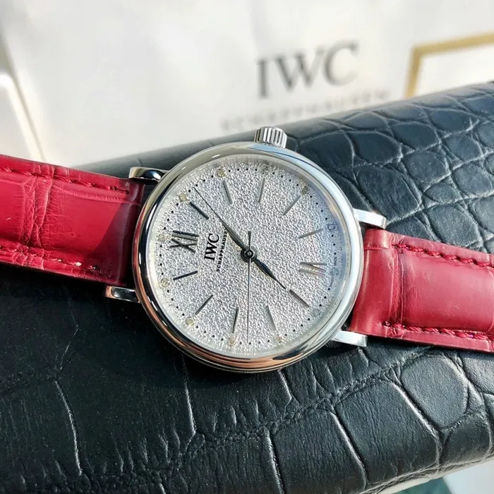 top-tier watch IWC women's white dial Portofino automatic movementleather strap watch side view