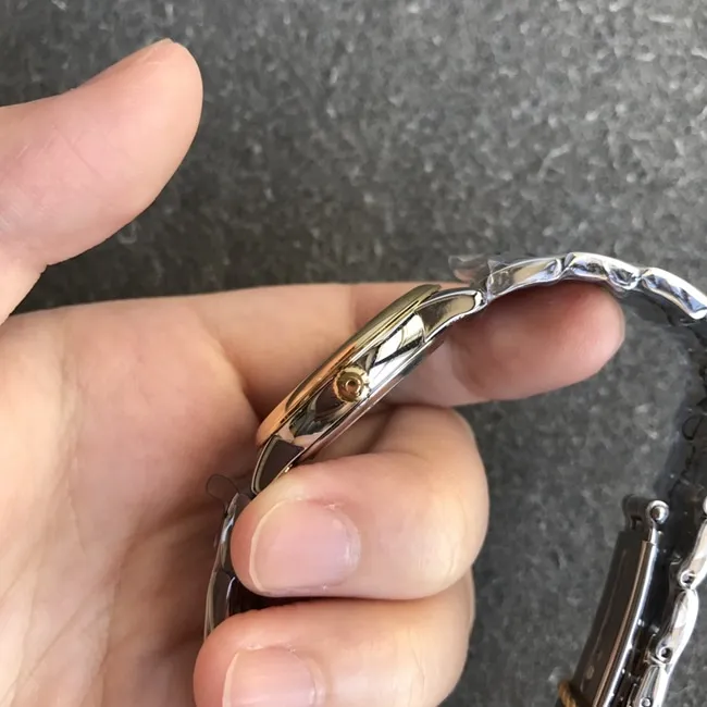 DK factory top-tier replicaOmegasuper watch women's white dial gold steel bracelet new quartz Diefei series watch clasp picture