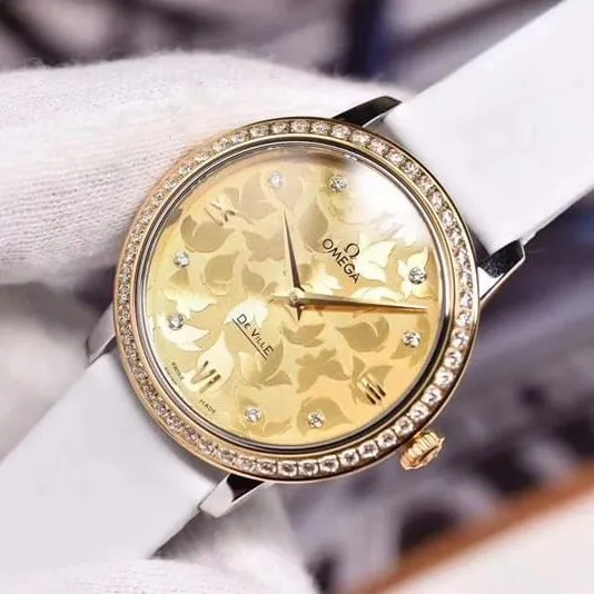 replicaOmega women's watch De Ville series rose gold butterfly dance 32.7mm front view