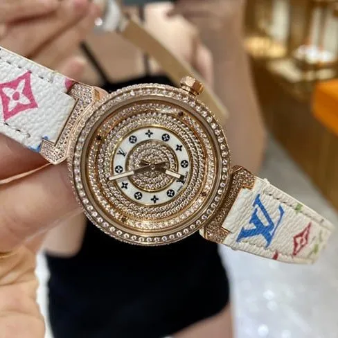LV Louis Vuitton top-tier quartz gold disc leather strap watch side view