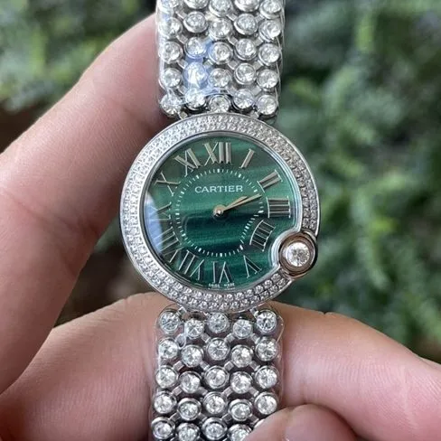 top-tier watch Cartier women's green dialsteel braceletquartz blue balloon series watch side view
