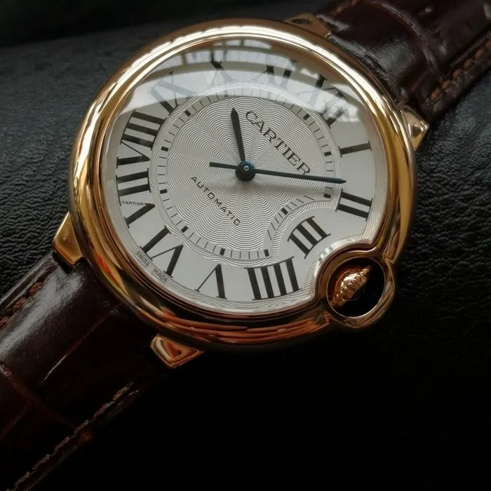 top-tier watch Cartier men's white dial blue balloon series c series leather strap watch side view