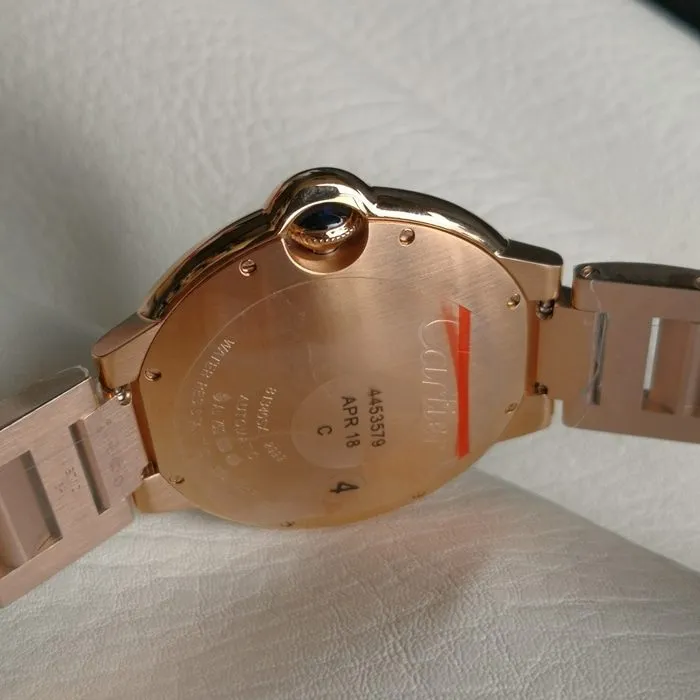 top-tier watch Cartier men's white dial blue balloon series steel bracelet watch side view