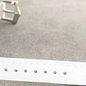 Patek Philippetop-tier watch fully automatic movement women's white dialleather strap side view