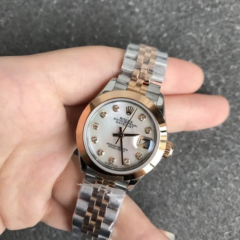 Rolex Datejust women's watch, 28mm, mechanical, fluted bezel, rose gold, mother-of-pearl dial, diamond hour markers, front view