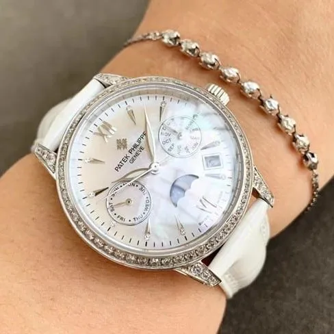 Patek Philippetop-tier watch fully automatic movement women's white dialleather strap side view
