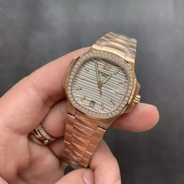 Patek Philippereplica watch Nautilusdiamond bezel full rose gold women's side view