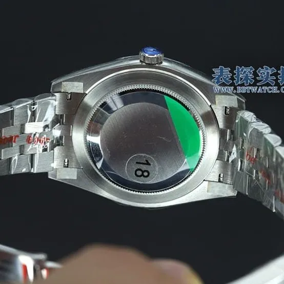 jvsRolex blue log watch tiger tooth ring