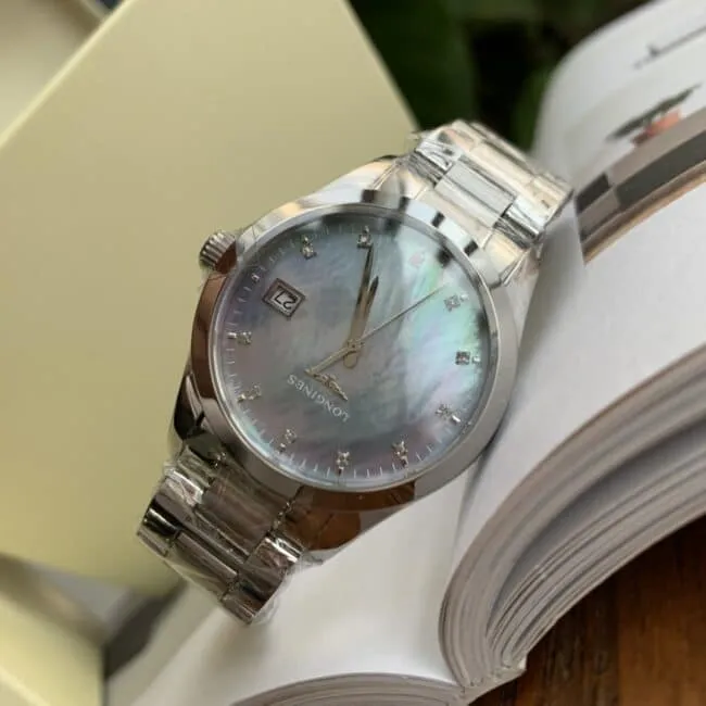 Longines Compaq series white steel blue background diamond ladies quartz watch 8 mm ultra-thin design side view