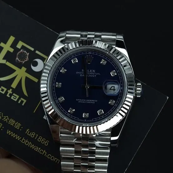 jvsRolex blue log watch tiger tooth ring overall