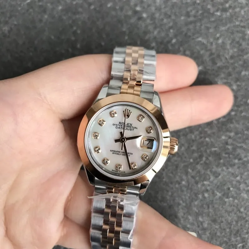 Rolex Datejust women's watch, 28mm, mechanical, fluted bezel, rose gold, mother-of-pearl dial, diamond hour markers, front view