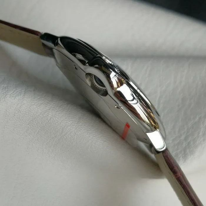 top-tier watch Cartier men's white dial blue balloon series leather strap watch side view
