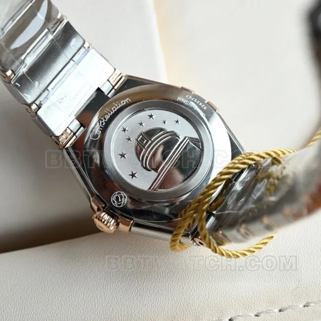 Omega Constellation watch, silver-white dial, 28mm, quartz, real shot from the side.