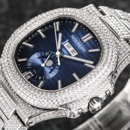 top-tier replicaPatek Philippe sporty and elegant baby's breath series Nautilus full diamond white steel blue dial men's mechanical watch clasp picture