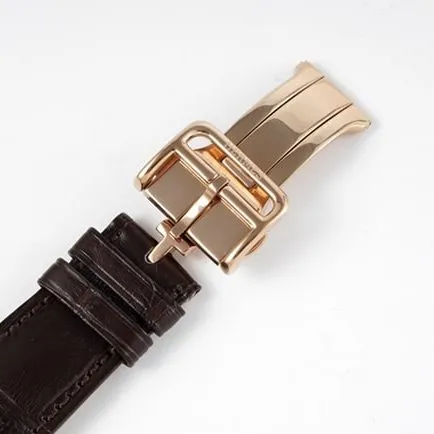 Top Hermes men's watch with white dial, brown strap, quartz movement, leather belt, clasp picture