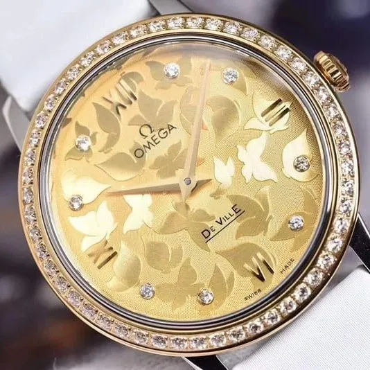 replicaOmega women's watch De Ville series rose gold butterfly dance 32.7mm front view