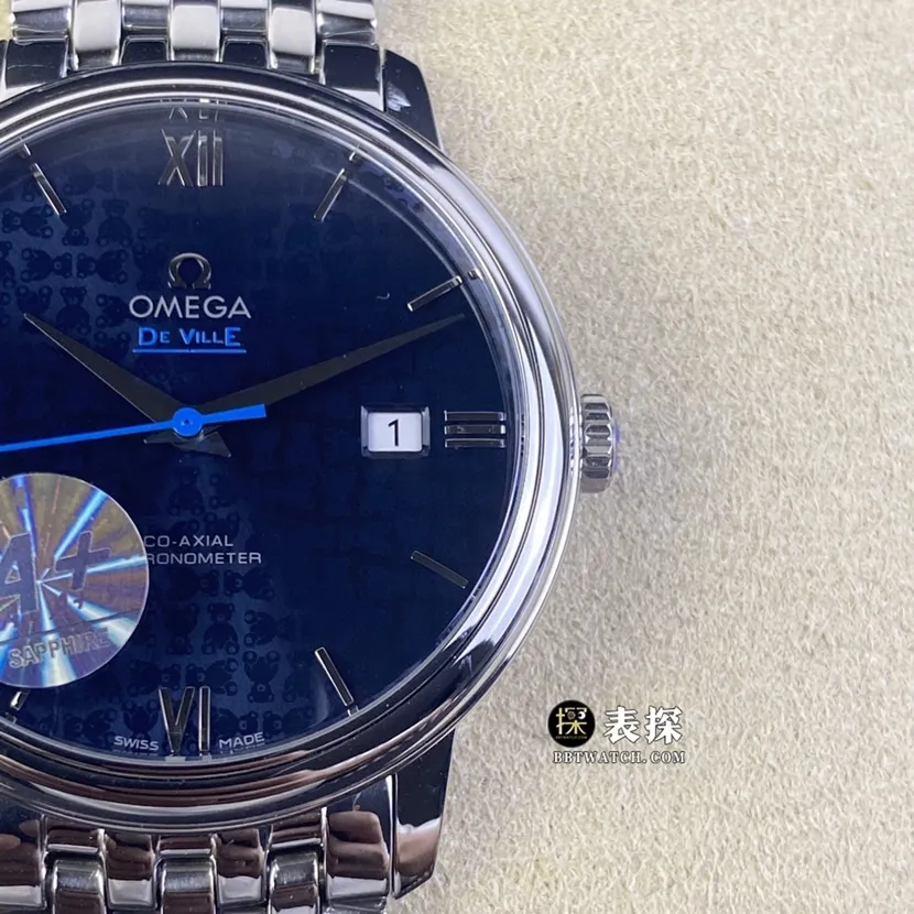 A+ factory Omega De Ville top-tier watch men's blue teddy bear pattern plate steel bracelet model pictures and prices side live photo