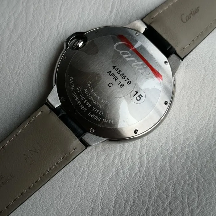 top-tier watch Cartier men's black dial blue balloon series mechanical leather strap watch side view
