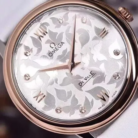 replicaOmega women's watch De Ville series yellow gold butterfly dance 32.7mm front view