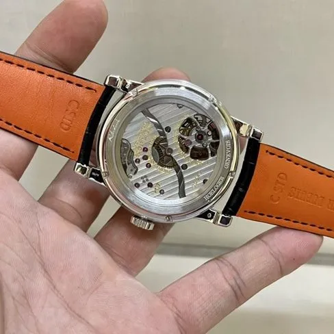 Top-tier watch Roger Dubuis men's white dial black belt 18kwhite goldtourbillon mechanical leather strap watch side view