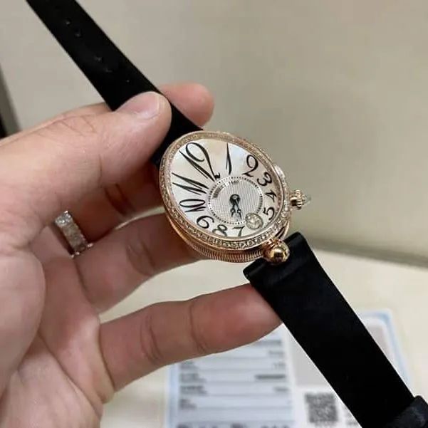 Real gold and real diamond Baoji top-tier watch queen series rose gold ladies diamondleather strap watch front view