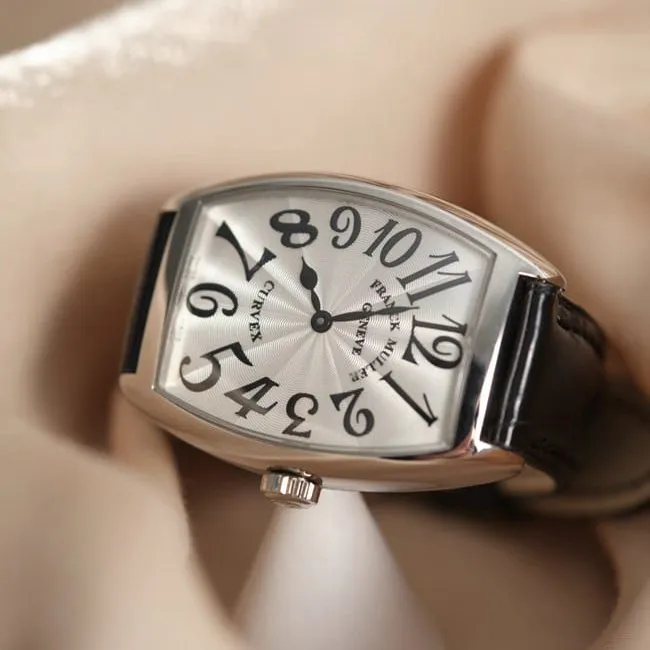 Franck Muller top-tier replicaquartz women's white dial black belt barrel-shaped leather strap watch side view