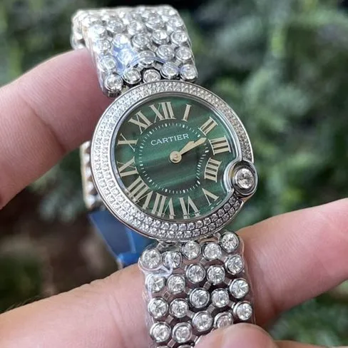 top-tier watch Cartier women's green dialsteel braceletquartz blue balloon series watch front view
