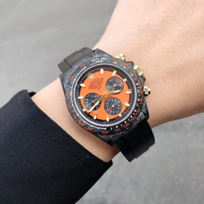 TW factory top-tier watch Rolex universe chronograph Daytona series carbon fiber customized version black dial orange bottom men's watch front view