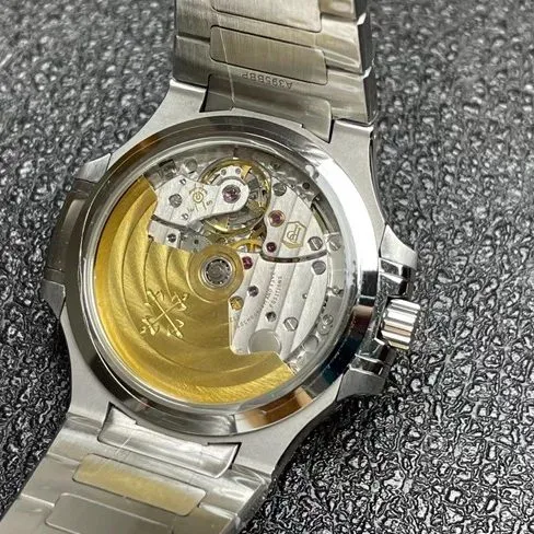 3K FactoryPatek Philippetop-tier watch women's white dialsteel bracelet fully automatic movementNautilus series watch movement picture