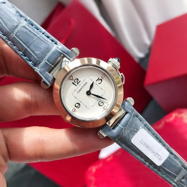 top-tier Cartier model 3 blue gold ladies watch front view