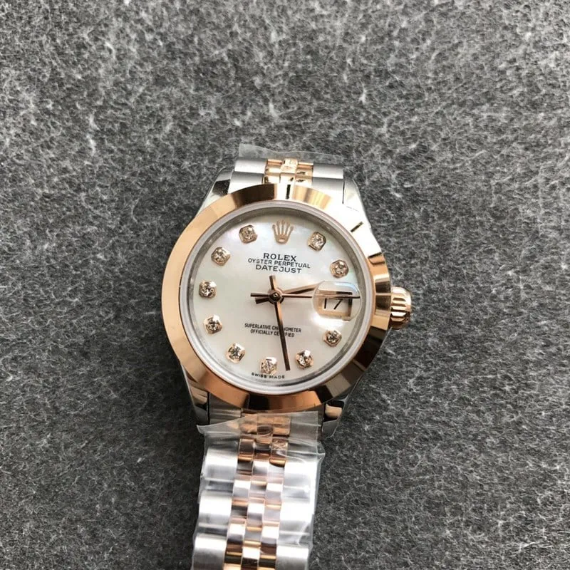 Rolex Datejust women's watch, 28mm, mechanical, fluted bezel, rose gold, mother-of-pearl dial, diamond hour markers, front view