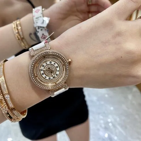 LV Louis Vuitton top-tier quartz gold disc leather strap watch side view