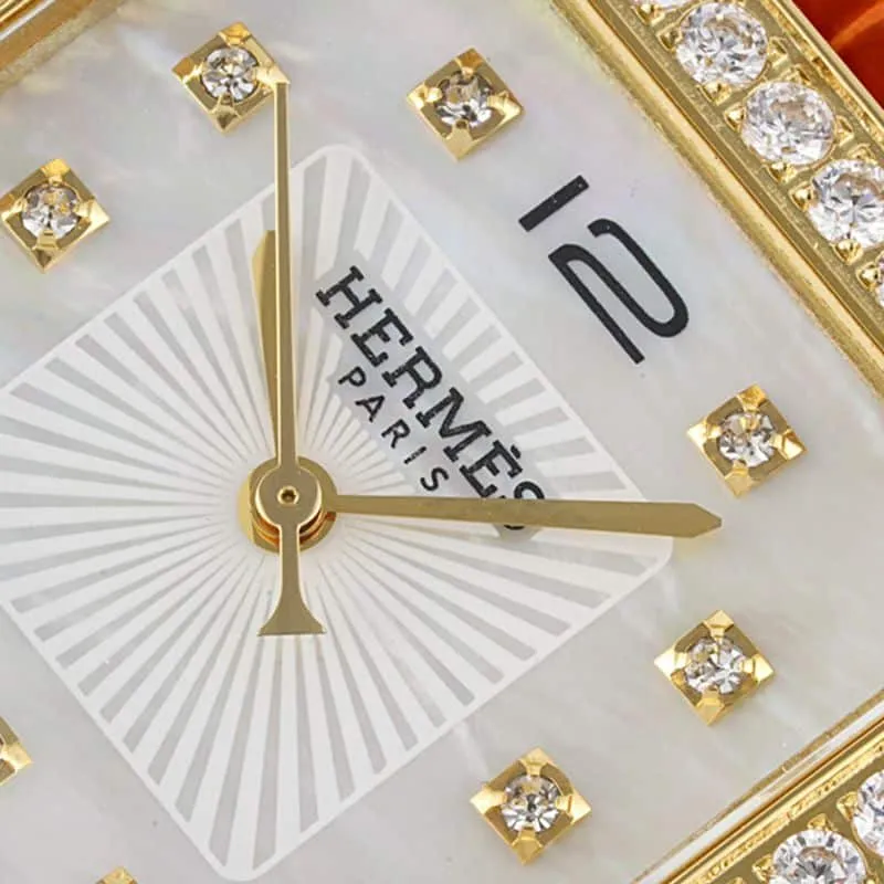 Hermès top-tier watch HeureH three-hand series ladies quartz white dial watch side view