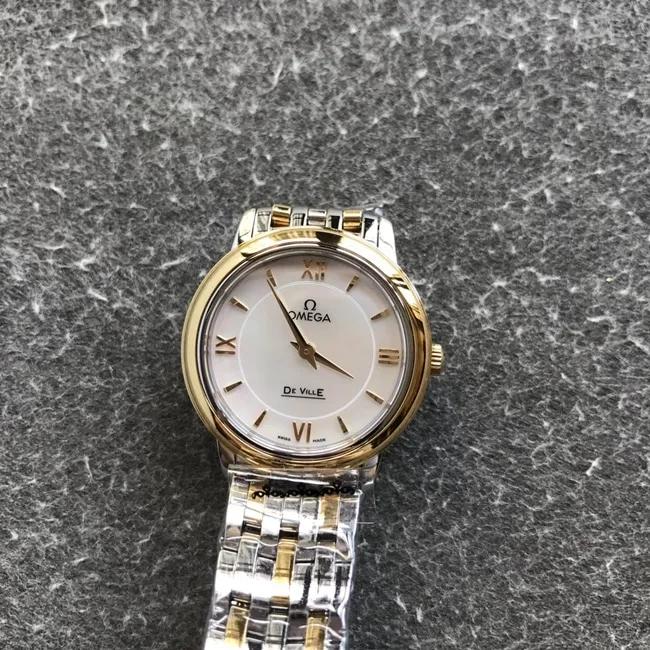 DK factory top-tier replicaOmegasuper watch women's white dial gold steel bracelet new quartz Diefei series watch front view