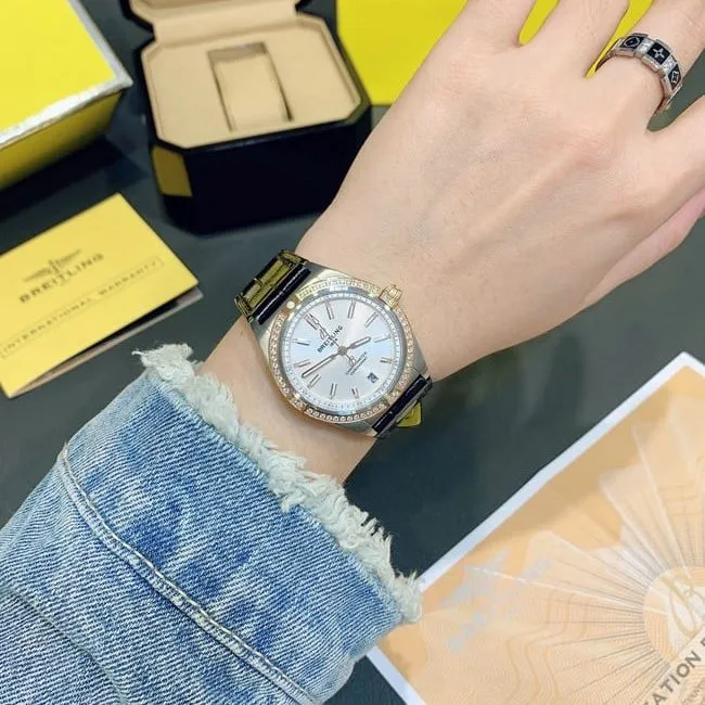 Breitlingtop-tier women's white dial black belt fully automatic movementleather strap Nanhai capsule series watch front view