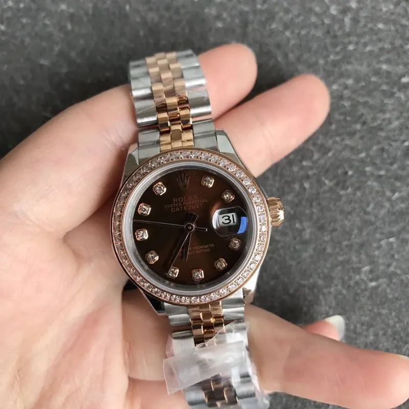 Refined Rolex Datejust women's watch, 28mm, mechanical bezel with diamonds, rose gold, coffee-colored dial, diamond hour markers, front view.