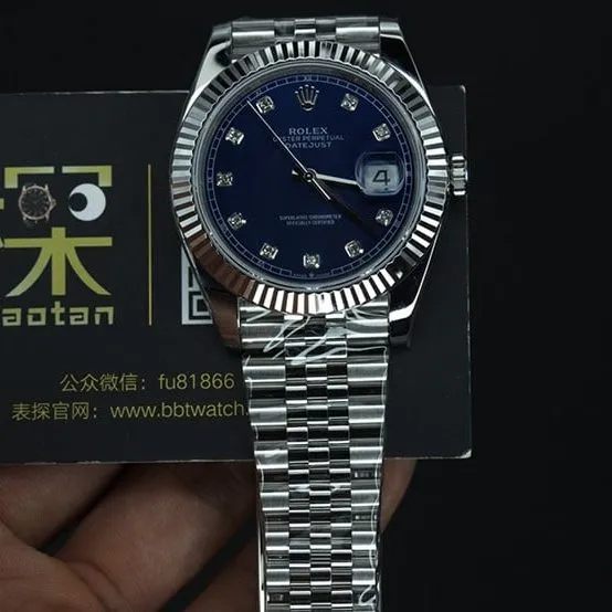 jvsRolex blue log watch tiger tooth ring