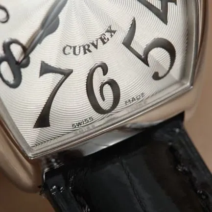 Franck Muller top-tier replicaquartz women's white dial black belt barrel-shaped leather strap watch front view