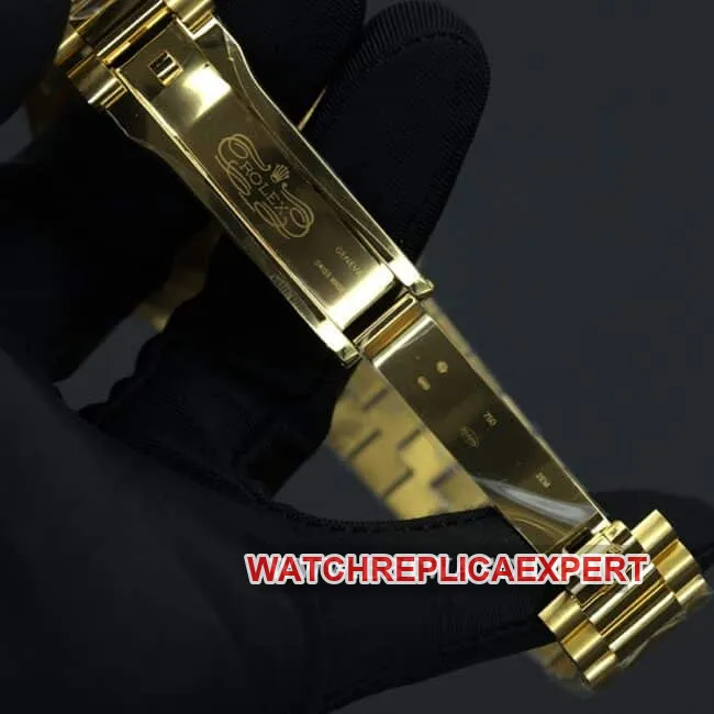 Rolex top collectible watches men's black plate gold band double calendar automatic mechanical front view