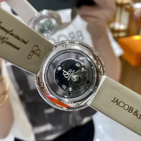 top-tier Jack Bao watch green dial white leather strap ladies quartz front view