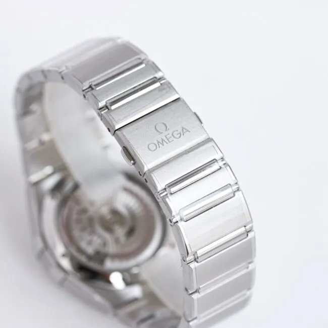 Top Omega 39mm Constellation series stainless steel watch, side view