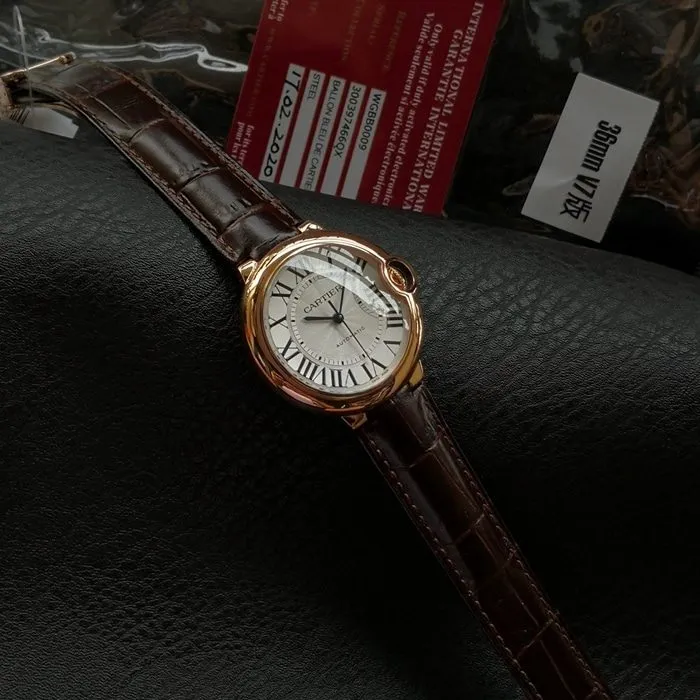 top-tier watch Cartier men's white dial blue balloon series c series leather strap watch front view