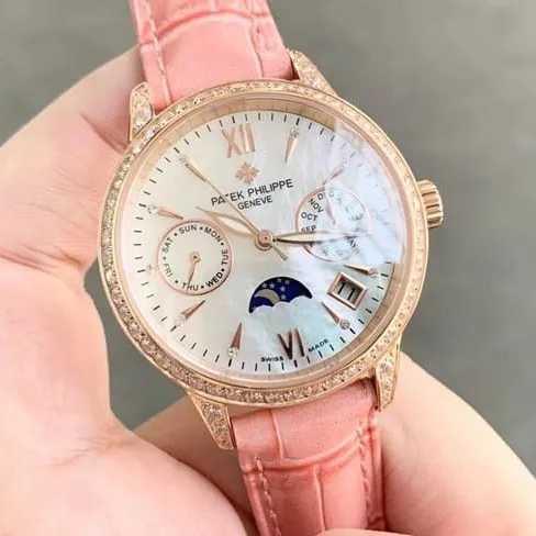 top-tier replicaPatek Philippehigh-quality ladies white dial pink belt fully automatic movementleather strap watch front view