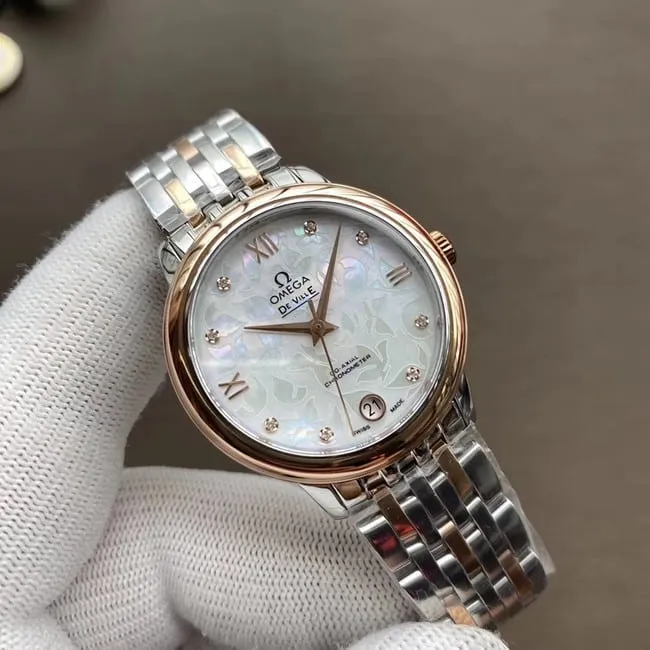 Top watch Omega De Ville series women's white dial two-tone metal bracelet mechanical watch front view