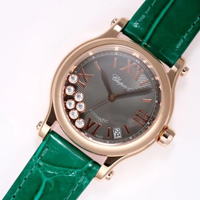 Top Chopard women's watch, black dial, green strap, HAPPY DIAMONDS series, mechanical leather strap, front view.