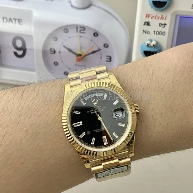 1:1replica watch QF factory RolexDay-Dateblack dialyellow gold2836movement40mm wearing live photos